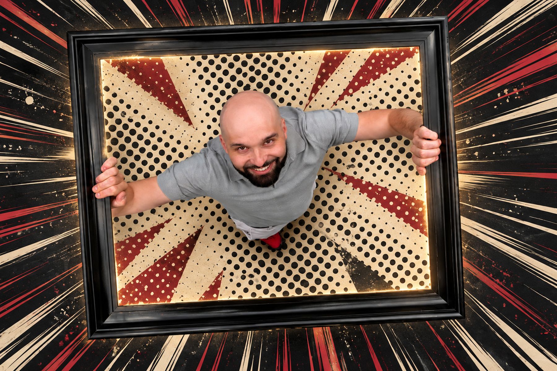 Niko Karppinen seen from above, smiling up at the camera and gripping the edges of a black picture frame against a comic-style halftone background